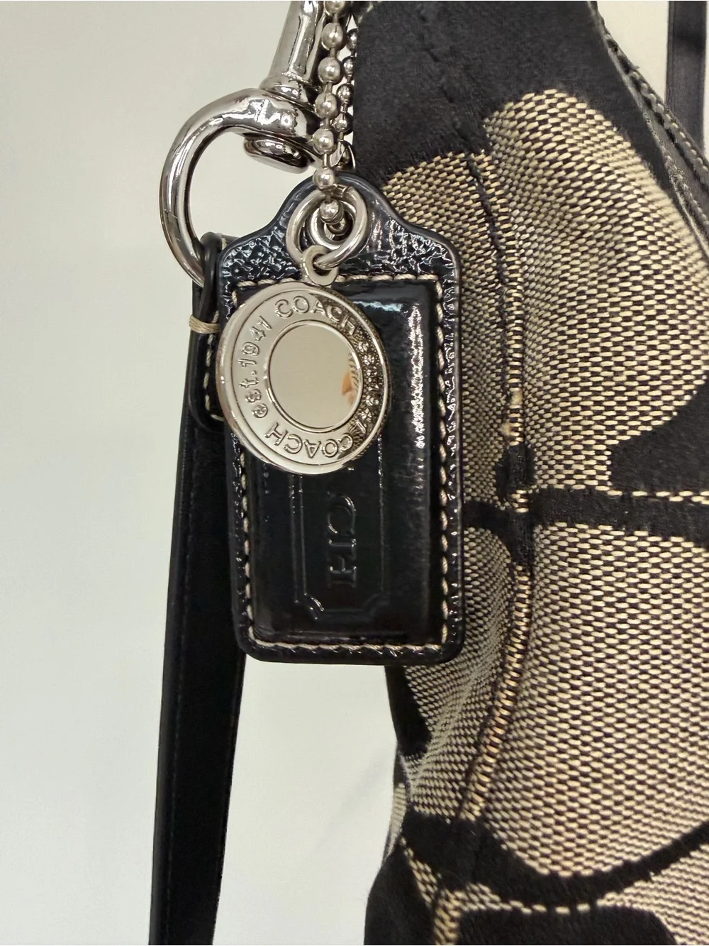 Coach iconic signature